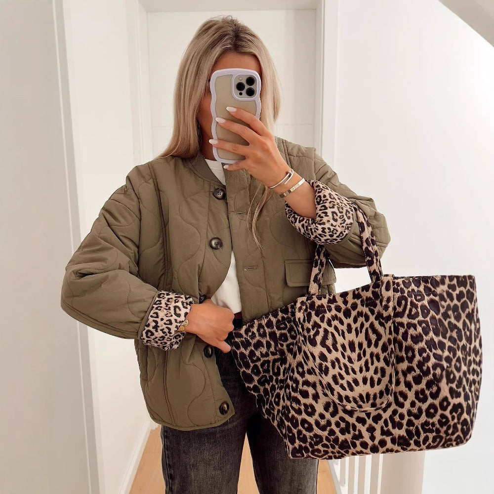 Damska ocieplana pikowana kurtka in boxy Cut z Round Neckline i naszywanymi kieszeniami Lumaza
