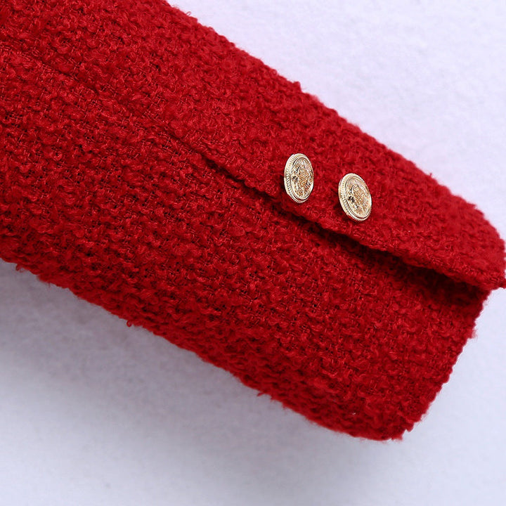 Damska krótka kurtka made of bouclé tweedowa in a krótka z a round neckline i golden decorative guzikami Lumaza