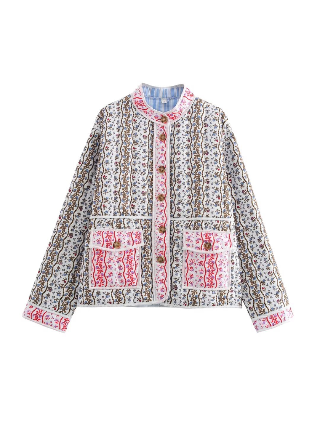 Damska pikowana krótka kurtka z Stójka, naszywane kieszenie i delikatna ethnic print
