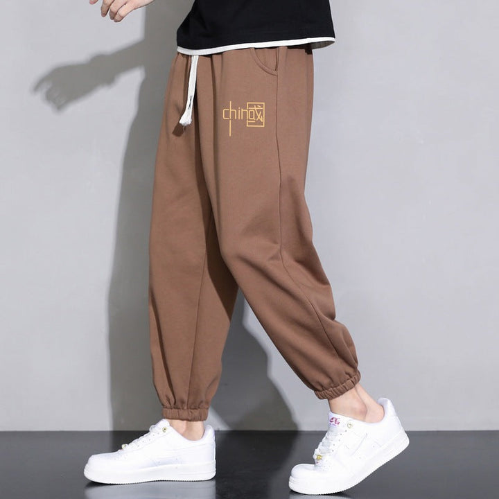 Męska luźna fitting sweatpants z ściągacz, elastyczne mankiety, i kieszenie boczne