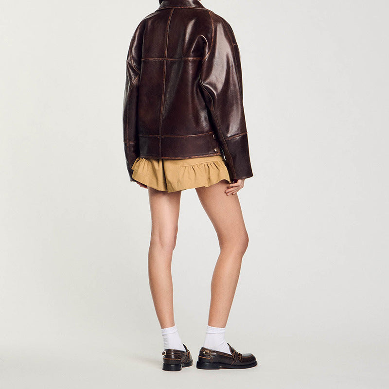 Damska krótka oversize Leather kurtka z Round kołnierzem i klapką kieszeniami Lumaza