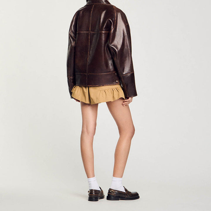 Damska krótka oversize Leather kurtka z Round kołnierzem i klapką kieszeniami Lumaza