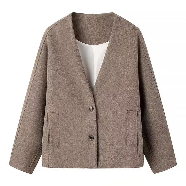 Damska krótka kurtka in boxy cut z V-neck i two-guzikami closure Lumaza