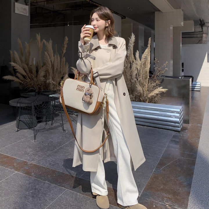 Damska długa Cut Minimalist trencz z Soft Fall, Dropped Shoulders i regulowanym rękawem Straps Lumaza