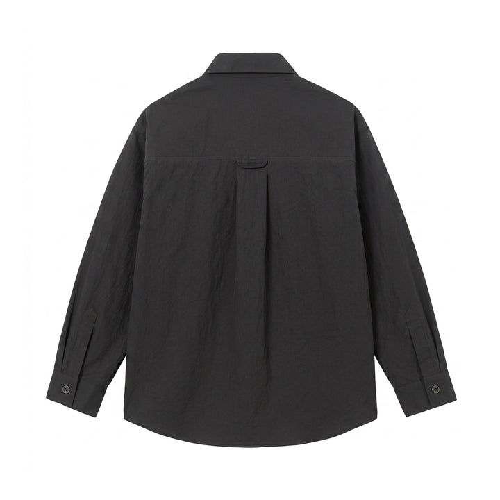 Męska utility kurtka koszulowa z oversize fit, naszywanymi kieszeniami, i ukryty listwą guzikową