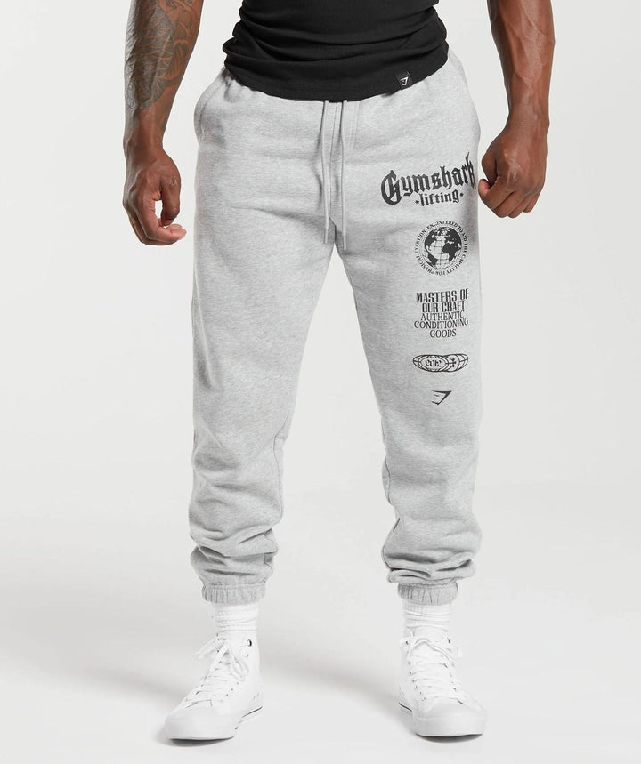 Męska tapered bawełna polar sweatpants z elastyczny ściągacz waistband, prążkowany nogawka otwory, i large logo print