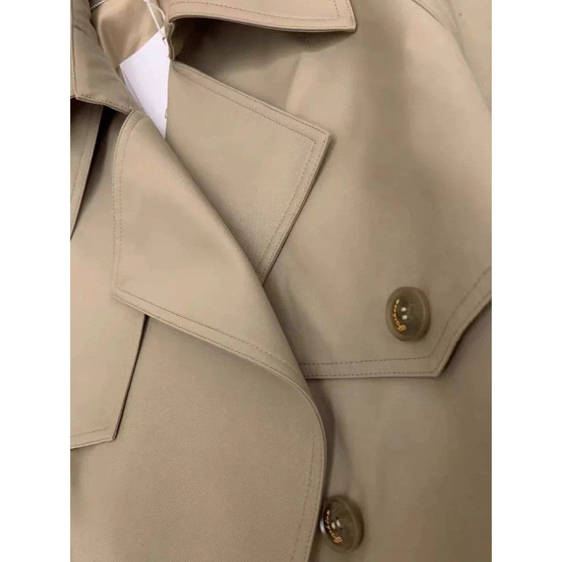 Damska elegancka midi trencz z oversize na ramiona klapką, gathered rękawami, i waist-defining wiązanym paskiem Lumaza