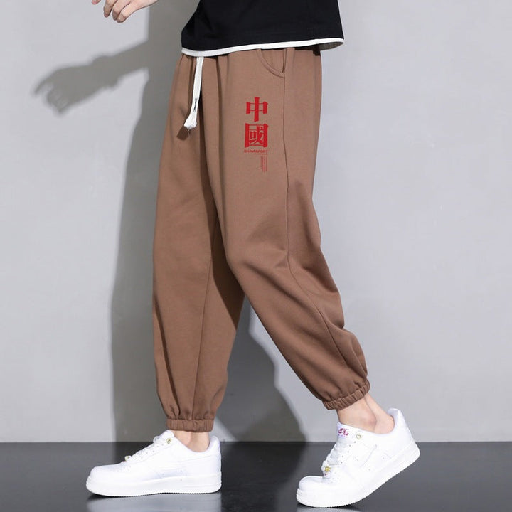Męska luźna fitting sweatpants z ściągacz, elastyczne mankiety, i kieszenie boczne