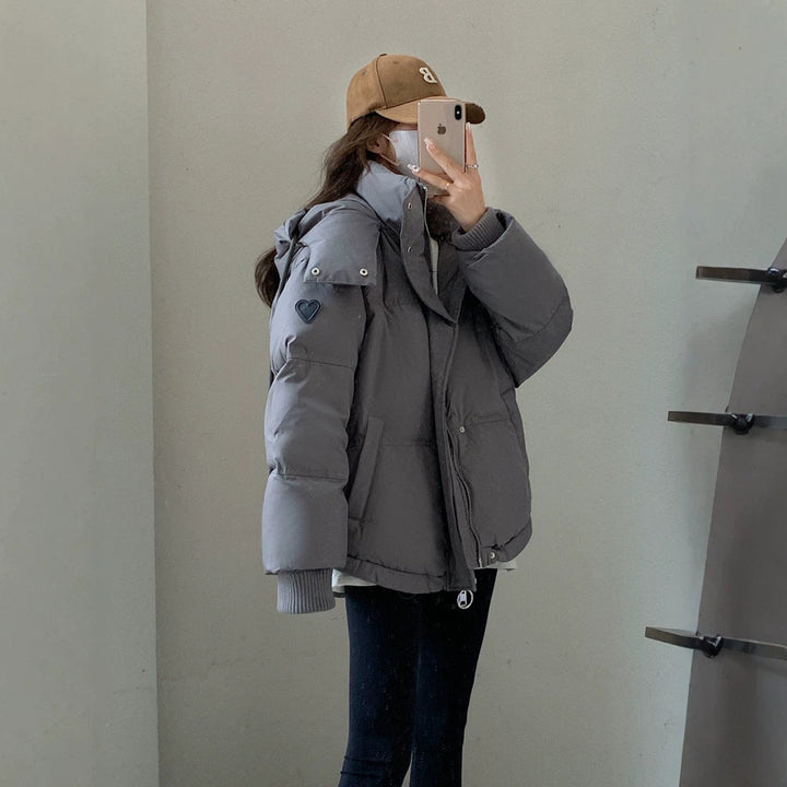 Damska oversize pikowana krótka kurtka z kapturem, windproof lining i oversize kołnierzem Lumaza