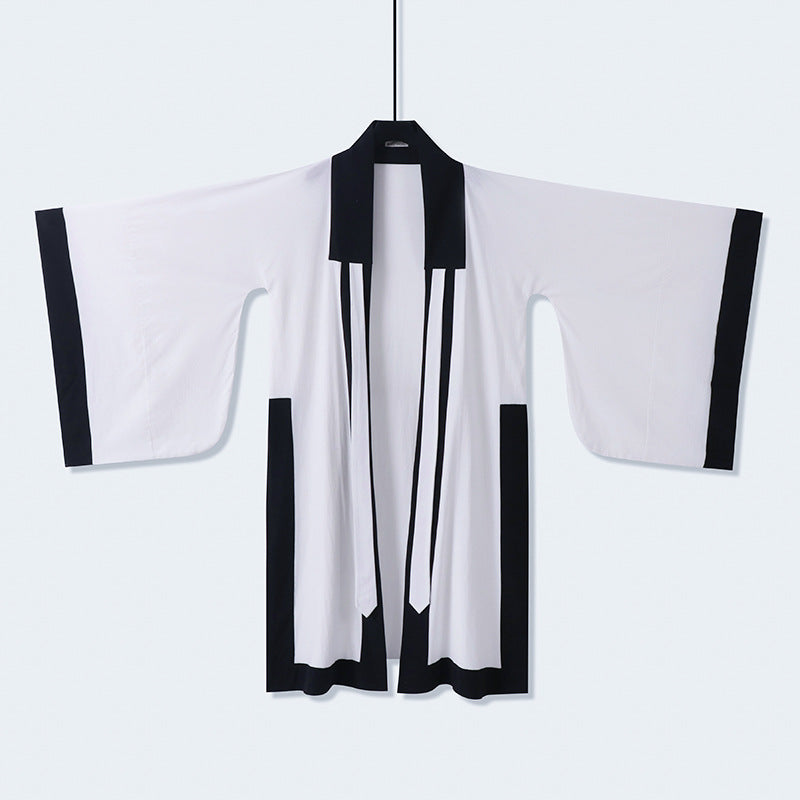 Unisex oversize kimono-kardigan z kontrastowy trim, wiązanym paskiem i z naszywanymi kieszeniami Lumaza