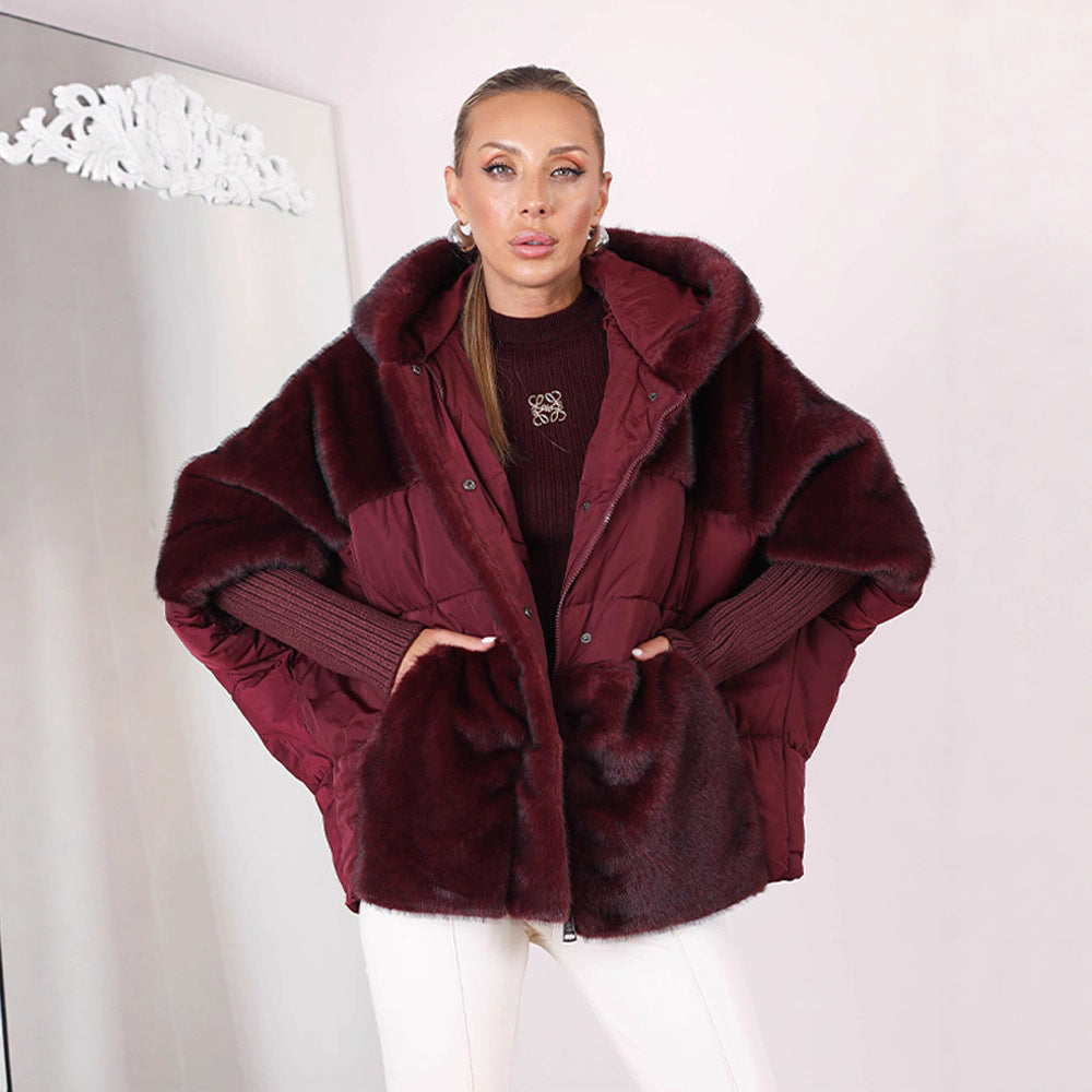 Damska krótka pikowana z kapturem kurtka z voluminous faux fur trim i oversize silhouette Lumaza