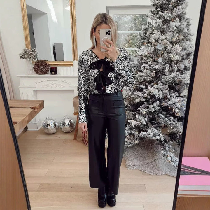 Damska krótka kurtka z Sequin Trim i Decorative Bow przodem Lumaza