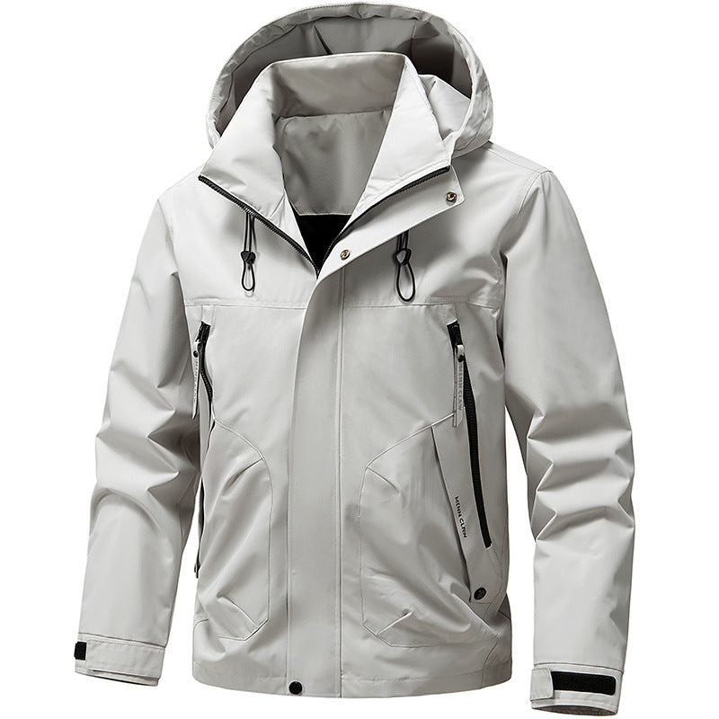 Męska oddychająca kurtka softshell outdoorowy z wiatroszczelna membrana, regulowany kapturem i zamkiem kieszeniami