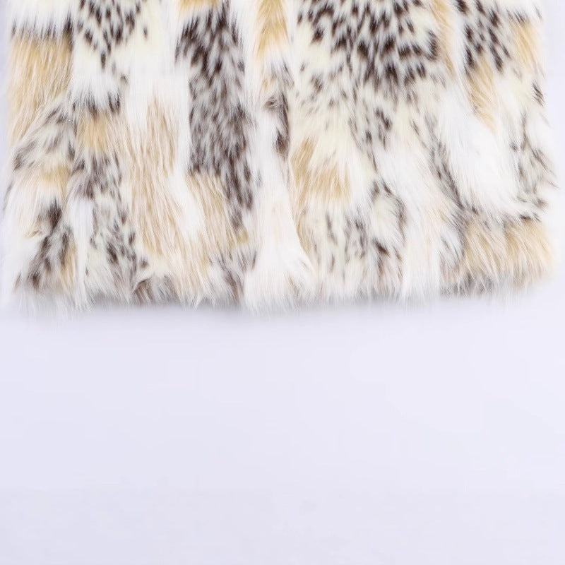 Damska krótka Faux Fur kurtka z stójka kołnierzem i Voluminous Faux Fur Lumaza