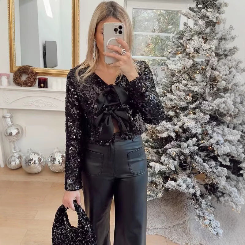 Damska krótka kurtka z Sequin Trim i Decorative Bow przodem Lumaza