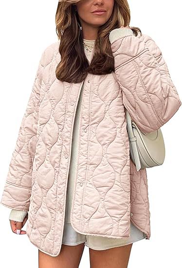 Damska pikowana kurtka in oversize design z curved pikowaniem i side slit Lumaza
