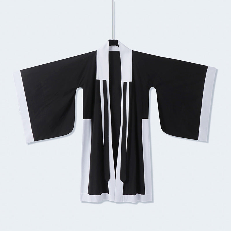 Unisex oversize kimono-kardigan z kontrastowy trim, wiązanym paskiem i z naszywanymi kieszeniami Lumaza
