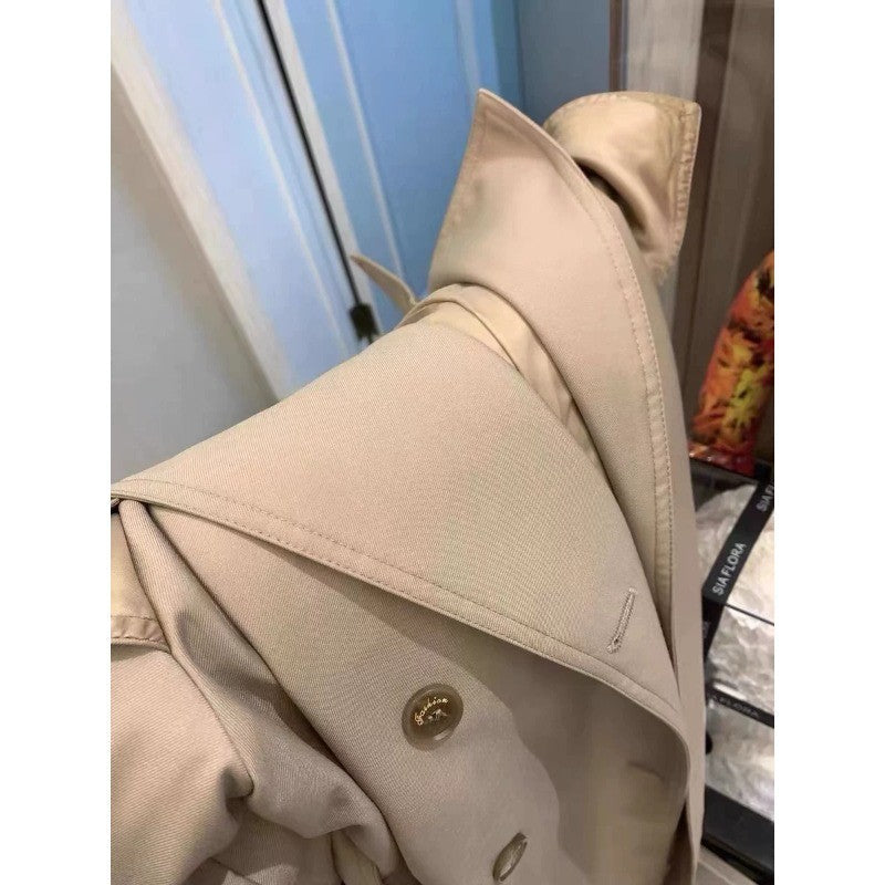 Damska elegancka midi trencz z oversize na ramiona klapką, gathered rękawami, i waist-defining wiązanym paskiem Lumaza