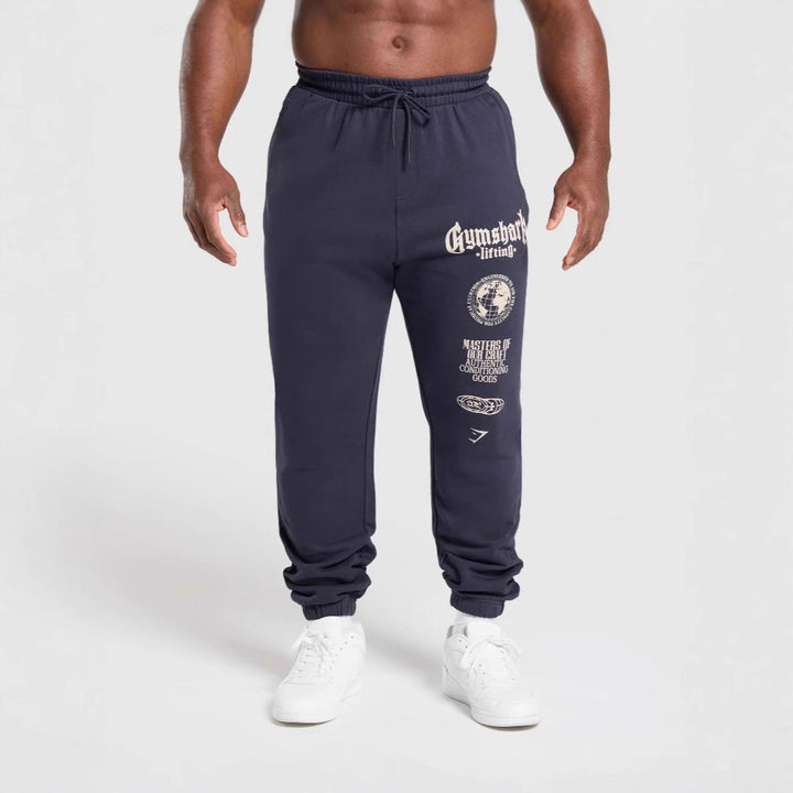 Męska tapered bawełna polar sweatpants z elastyczny ściągacz waistband, prążkowany nogawka otwory, i large logo print
