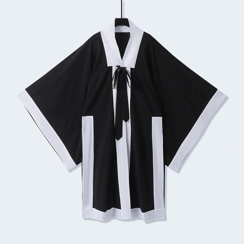 Unisex oversize kimono-kardigan z kontrastowy trim, wiązanym paskiem i z naszywanymi kieszeniami Lumaza